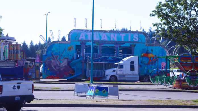 Shooting Stars Amusement setting up the midway of the Prince Rupert summer carnival.