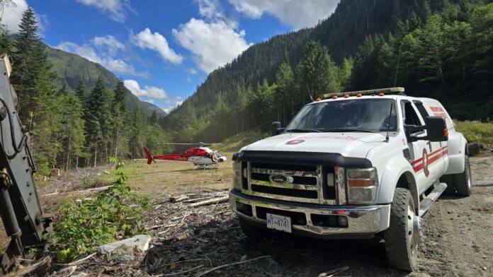 Prince Rupert Ground Search and Rescue truck and helicopter. Photo by Prince Rupert Ground Search and Rescue via Facebook