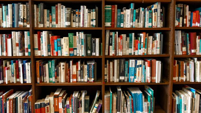 Assorted Books on Book Shelves Photo by Element5 Digital via Pexels.com