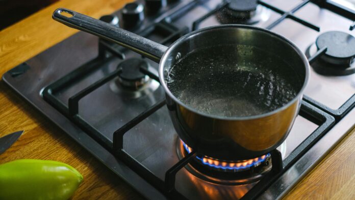 water boiling on the stove Photo by Anna Shvets via pexels.com